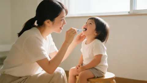 政策と家庭の「二輪駆動」：子どもの口腔健康を真に守る方法